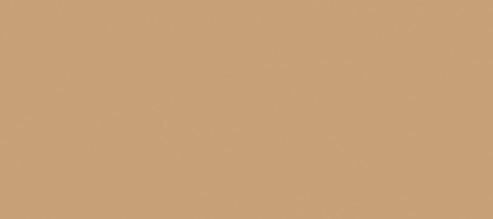 A dark stairwell is illuminated by window light.